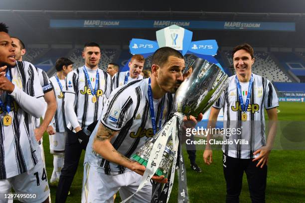 Leonardo Bonucci of Juventus kisses the PS5 Supercup following their side's victory in the Italian PS5 Supercup match between Juventus and SSC Napoli...