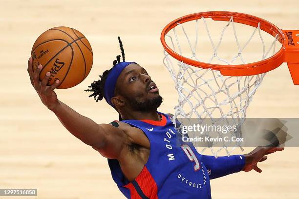 Jerami Grant of the Detroit Pistons dunks an alley-oop against the Atlanta Hawks during the first half at State Farm Arena on January 20, 2021 in...