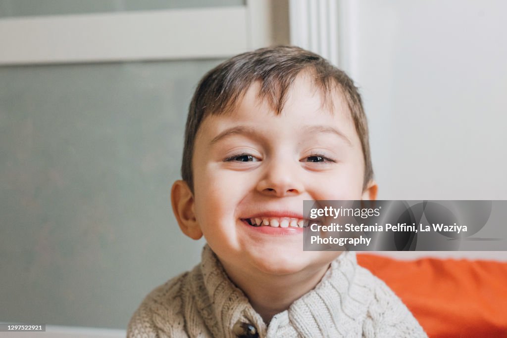 Portrait of a Caucasian 3 years old smiling boy