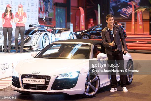 Real Madrid player Cristiano Ronaldo receives a new Audi car at Carlos Sainz Center on October 20, 2011 in Madrid, Spain.