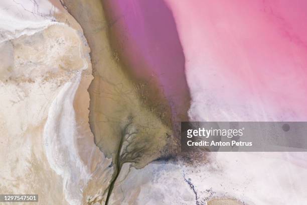 aerial view of the salty pink lake. pink salt lake hutt lagoon - mining from above ストックフォトと画像
