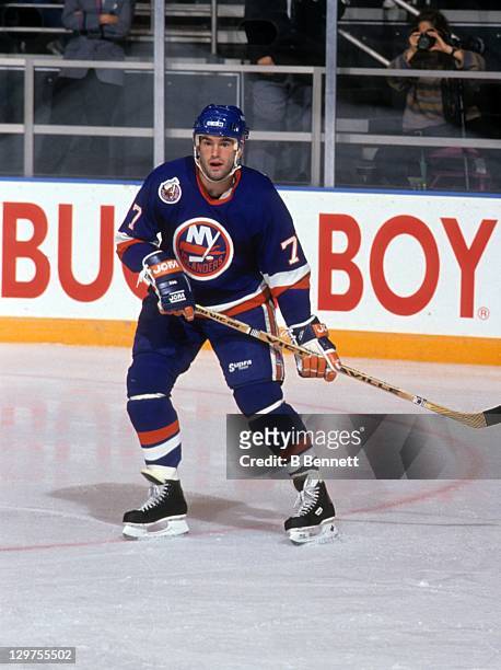 Pierre Turgeon of the New York Islanders skates on the ice during an NHL game against the New York Rangers on October 18, 1992 at the Madison Square...