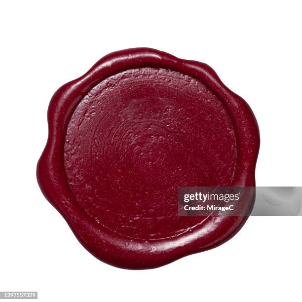 maroon colored sealing wax stamp - burgundy stockfoto's en -beelden