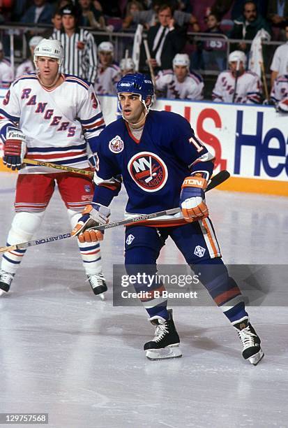 Marty McInnis of the New York Islanders skates on the ice during an NHL game against the New York Rangers circa 1993 at the Madison Square Garden in...