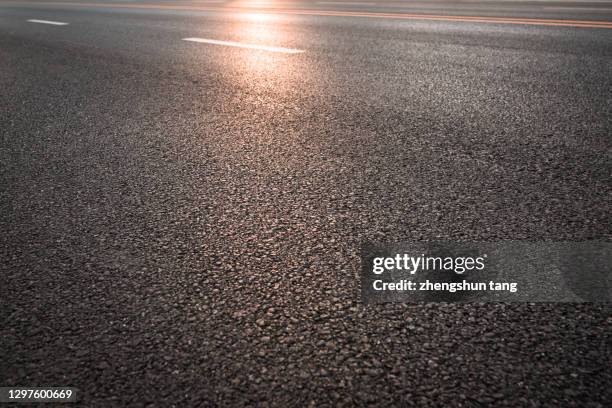 sunlight shining on the highway. - lisa tang imagens e fotografias de stock