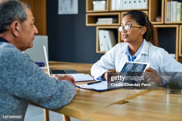 good doctors are good communicators - neurologist stock pictures, royalty-free photos & images