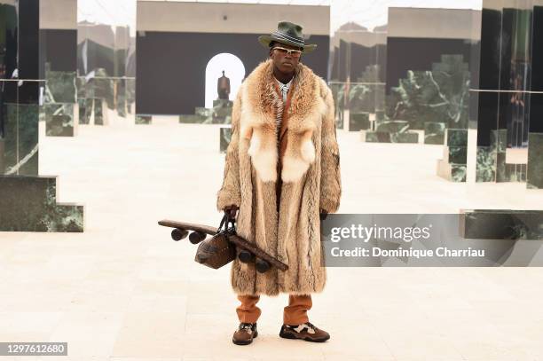 In this images relesead juanuary 21, model walks the runway during the Louis Vuitton Menswear Fall/Winter 2021-2022 show as part of Paris Fashion...