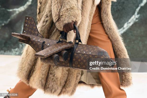 In this images relesead juanuary 21, model walks the runway during the Louis Vuitton Menswear Fall/ 2021-2022 show as part of Paris Fashion Week on...