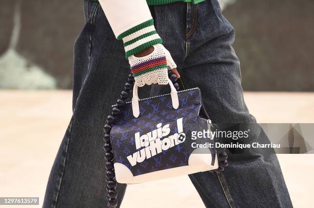In this images relesead juanuary 21, model walks the runway during the Louis Vuitton Menswear Fall/ 2021-2022 show as part of Paris Fashion Week on...
