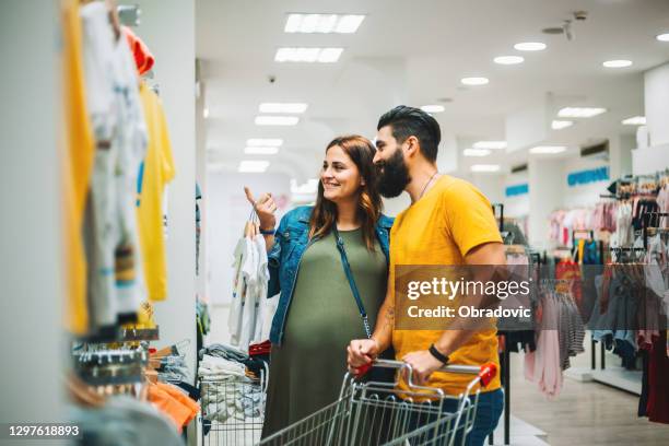 pregnant woman -shopping - baby boutique stock pictures, royalty-free photos & images