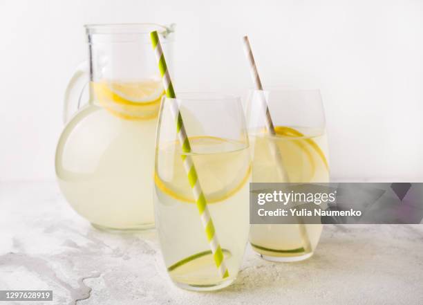 homemade lemonade with fresh lemons. - pitcher lemonade stock pictures, royalty-free photos & images