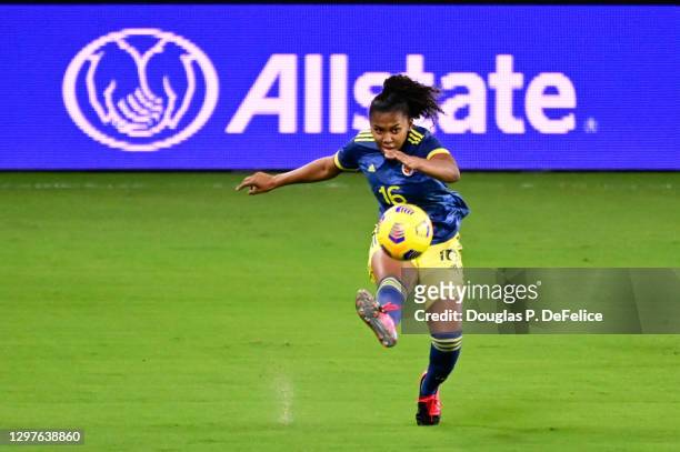 Jorelyn Carabali of Colombia looks to kick the ball during the first half against the United States Women's National Soccer Team at Exploria Stadium...