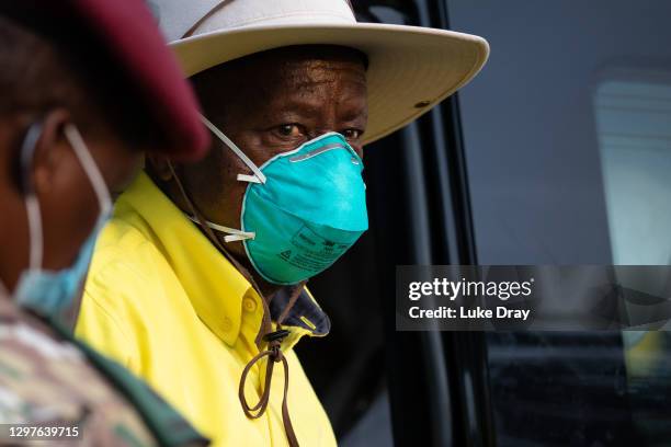 President Yoweri Museveni stops to speak to supporters as he heads back to his residence on January 21, 2021 in Kampala, Uganda. The electoral...