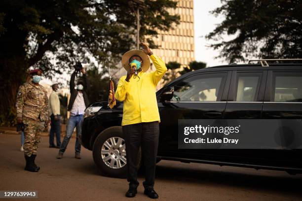 President Yoweri Museveni stops to speak to supporters as he heads back to his residence on January 21, 2021 in Kampala, Uganda. The electoral...