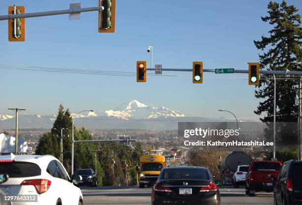 mountain view from fraser highway in surrey, canada - surrey british columbia stock pictures, royalty-free photos & images