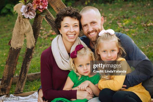 family of four outside - 2 year old blonde girl father stock pictures, royalty-free photos & images