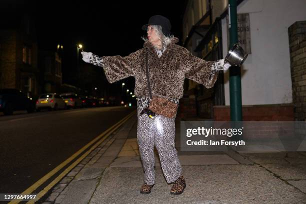 Woman takes part in the Clap for Heroes event in Saltburn on January 21, 2021 in Saltburn-by-the-Sea, England. During the first Coronavirus pandemic...