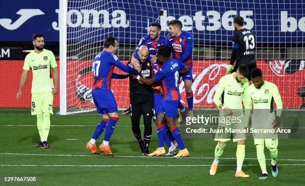 Marko Dmitrovic of SD Eibar celebrates with team mates after scoring their side's first goal from the penalty spot during the La Liga Santander match...