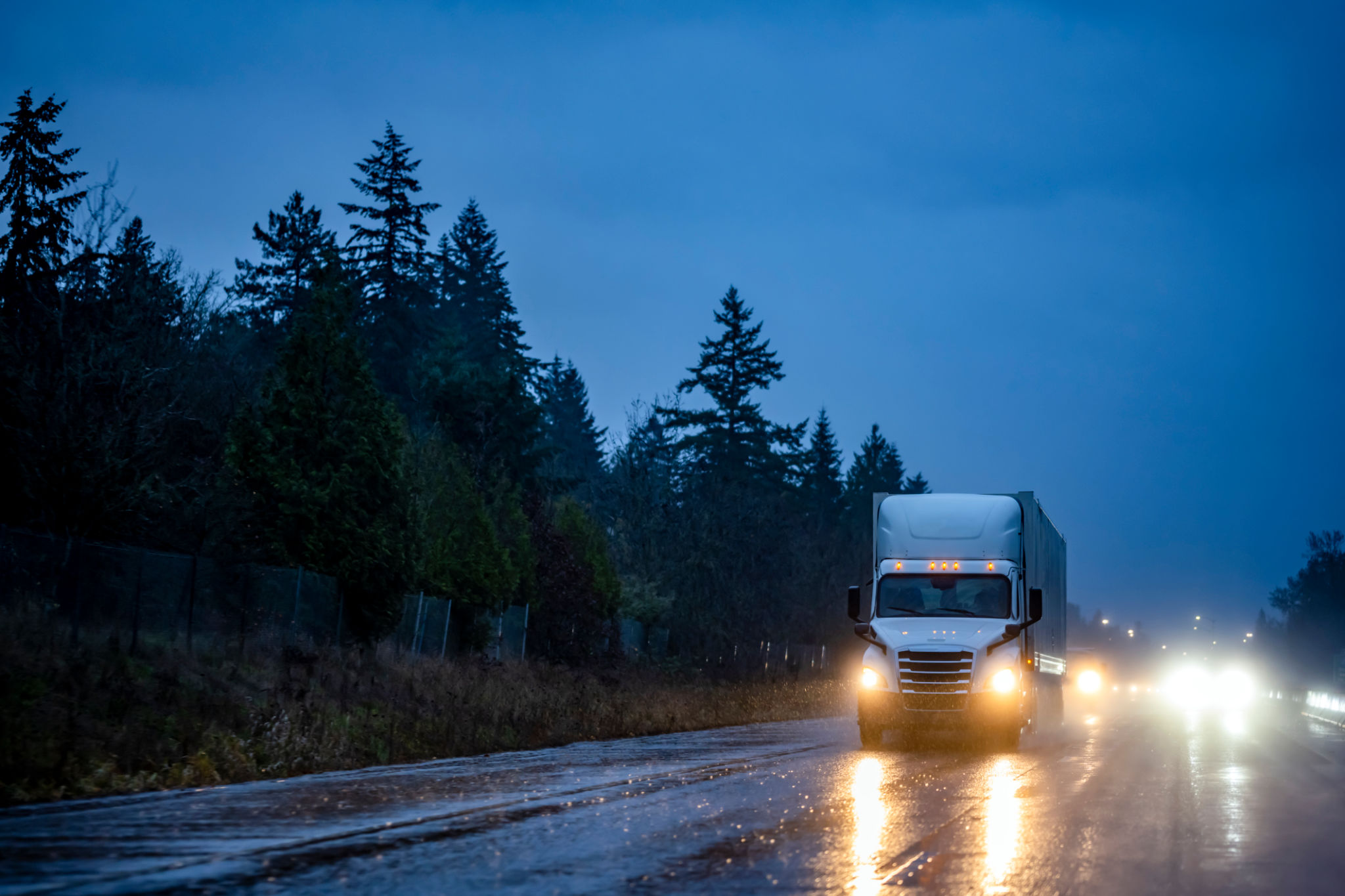 truck driving in rain