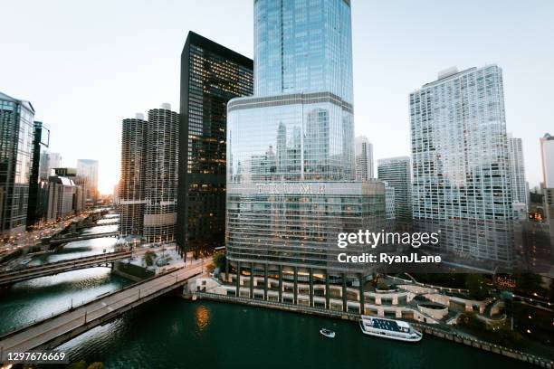 wide angle cityscape of chicago river waterfront - trump international hotel & tower stock pictures, royalty-free photos & images