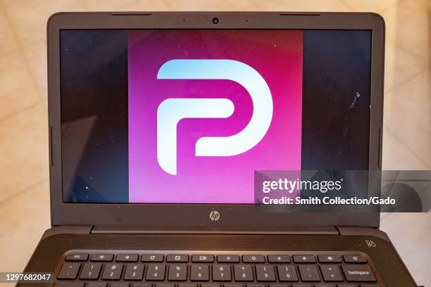 Illustrative image of laptop showing logo for the social media platform Parler, Lafayette, California, January 21, 2021.