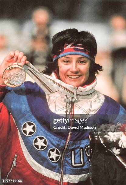 Bonnie Blair of the United States celebrates her Olympic gold medal won in the the Women's 1000 meter long track speed skating event of the 1992...