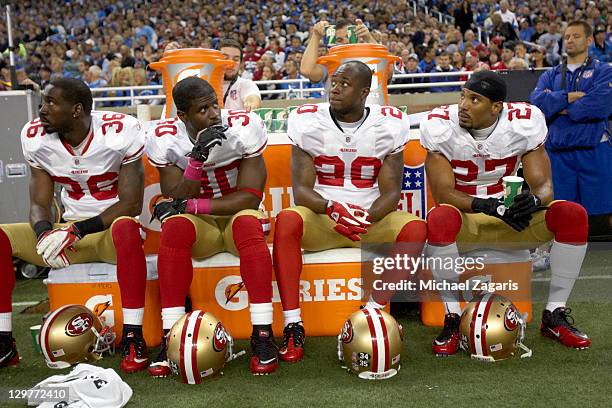 San Francisco 49ers Shawntae Spencer , Reggie Smith , Madieu Williams and C.J. Spillman on bench during game vs Detroit Lions at Ford Field. Detroit,...