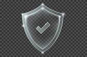 Transparent shiny shield with check mark symbol inside. Realistic protection sign. White security plate with reflections and light sparkles. Vector illustration isolated on transparent background.