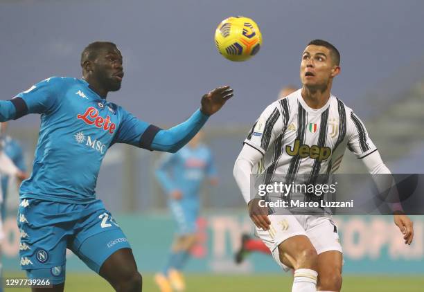 Cristiano Ronaldo of Juventus FC competes for the ball with Kalidou Koulibaly of SSC Napoli during the Italian PS5 Supercup match between Juventus...