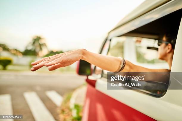 95 Hand Waving Car Window Stock Photos, High-Res Pictures, and Images ...