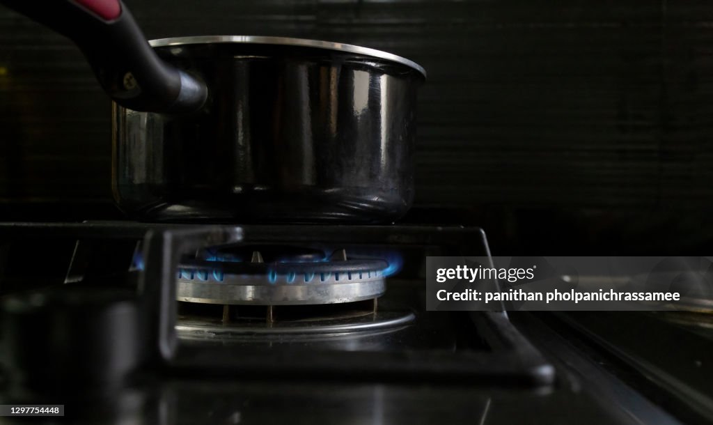 Closeups of a natural gas stove flame.