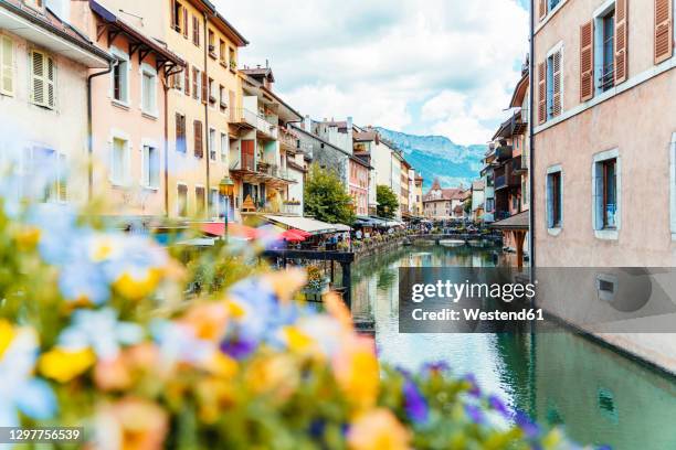 old city center with river and mountains at annecy, france - annecy stock pictures, royalty-free photos & images