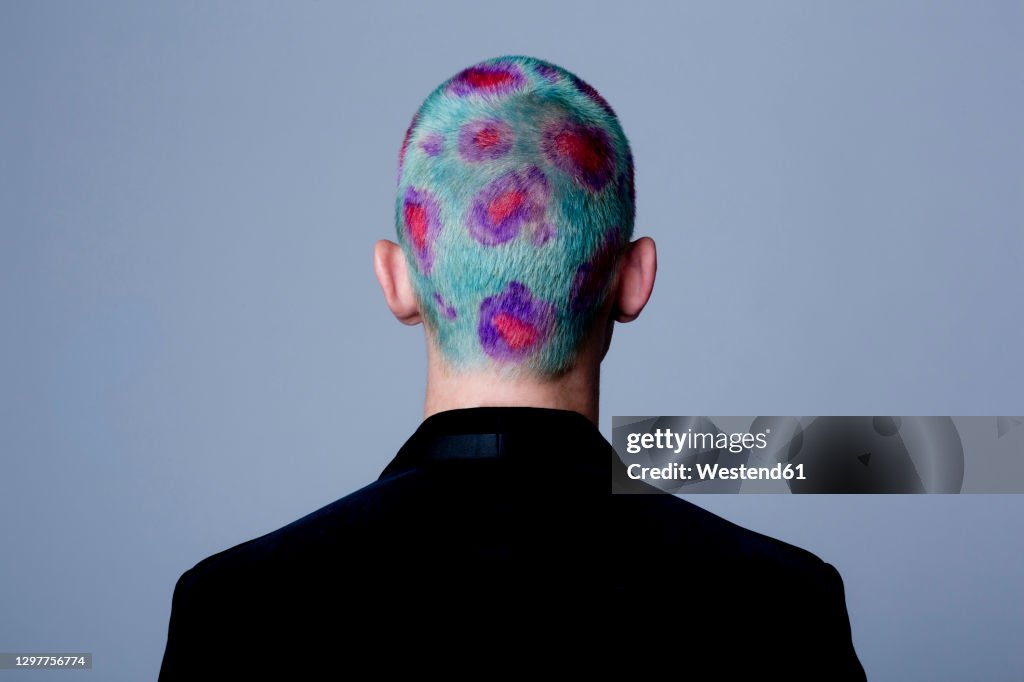 Young man with dyed shot hair studio