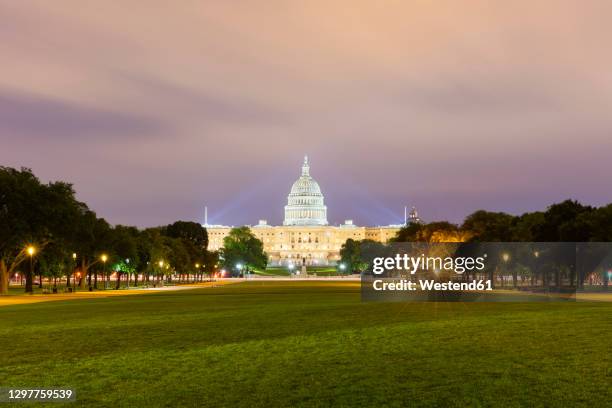 usa, washington dc, eastern end of national mall at night with united states capitol in background - the mall stock pictures, royalty-free photos & images