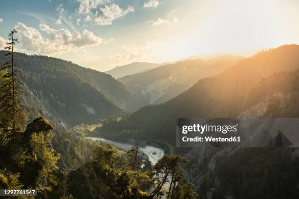 river in valley at sunset - graubunden canton ストックフォトと画像