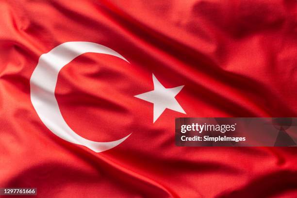 turkey flag blowing in the wind. - bandera turca fotografías e imágenes de stock