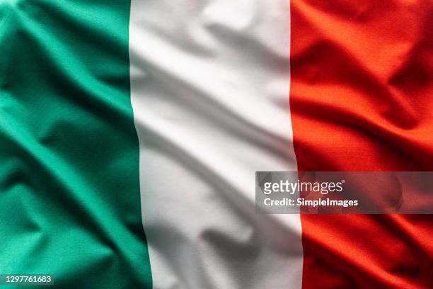 flag of austria blowing in the wind. - italien stock-fotos und bilder
