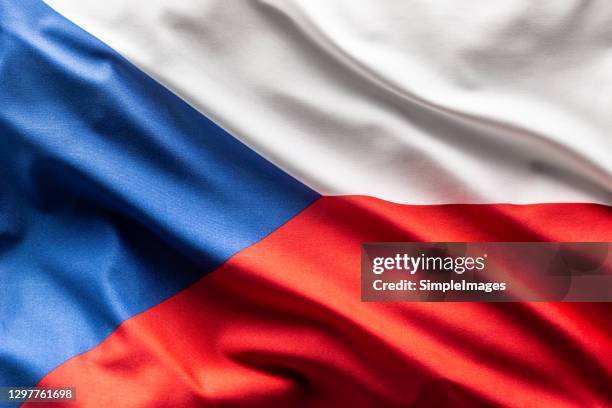 flag of czech republic blowing in the wind. - tschechische republik stock-fotos und bilder