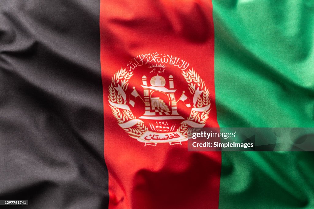 Flag of Afghanistan blowing in the wind.