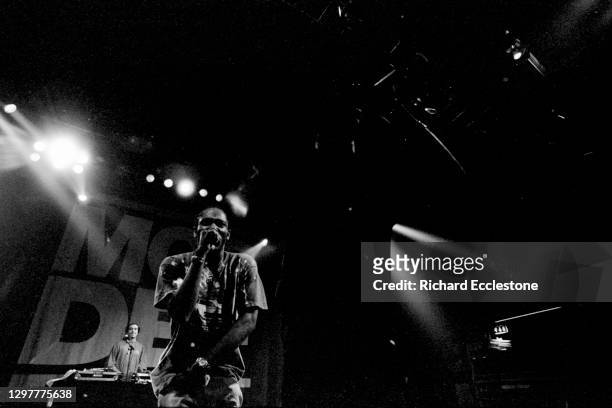 American rapper, singer, actor and activist Mos Def performs on stage in 1998.