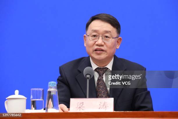 Liang Tao, Vice Chairman of the China Banking and Insurance Regulatory Commission, speaks during a news conference to brief the media about the...