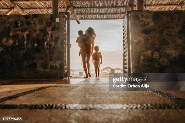 family going to the beach - mexican and white baby stock pictures, royalty-free photos & images