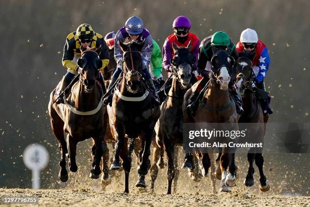 David Probert riding Buy Me Back on their way to winning The Play 4 To Score At Betway Handicap at Lingfield Park Racecourse on January 22, 2021 in...