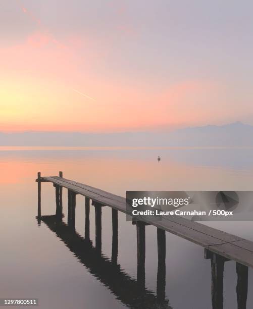 scenic view of sea against sky during sunset,lake geneva,wisconsin,united states,usa - lake geneva wisconsin ストックフォトと画像