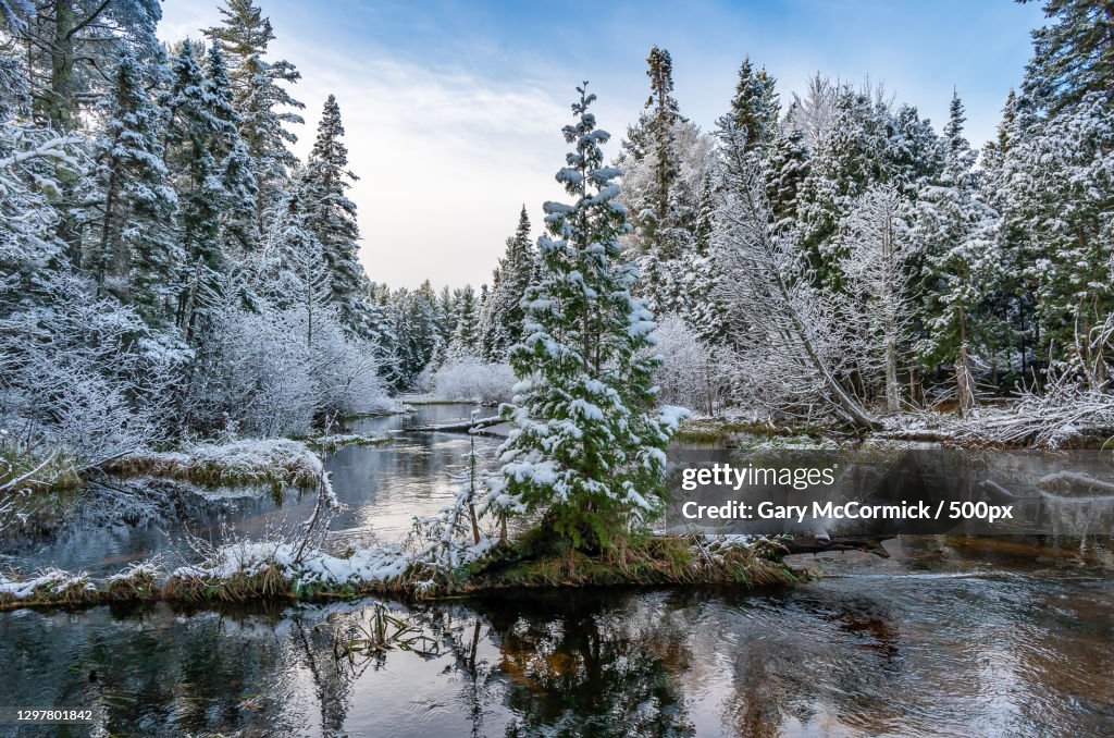 Scenic view of lake against sky during winter,Grand Marais,Michigan,United States,USA