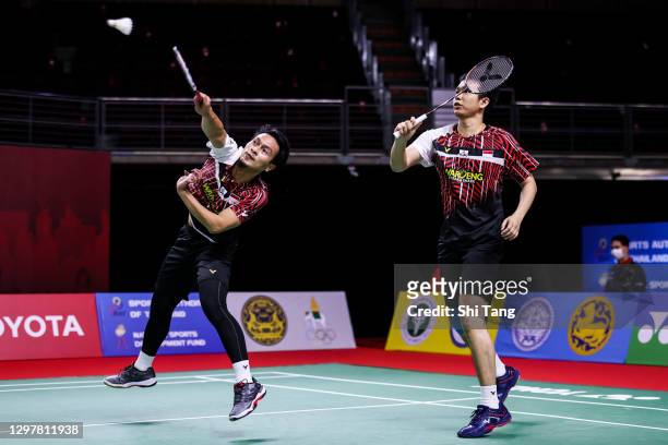 Hendra Setiawan and Mohammad Ahsan of Indonesia compete in the Men's Doubles quarter finals match against Ben Lane and Sean Vendy of England on day...