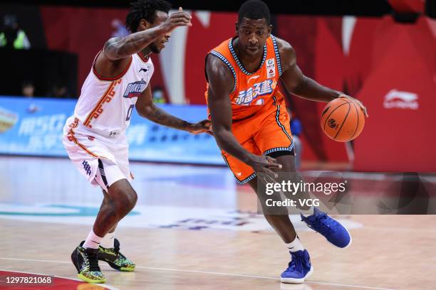 Andrew Nicholson of Fujian Sturgeons drives the ball against Sean Hill of Nanjing Monkey Kings during 2020/2021 Chinese Basketball Association League...