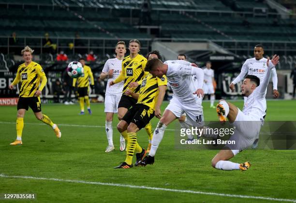 Nico Elvedi of Gladbach scores the opening goal during the Bundesliga match between Borussia Moenchengladbach and Borussia Dortmund at Borussia-Park...