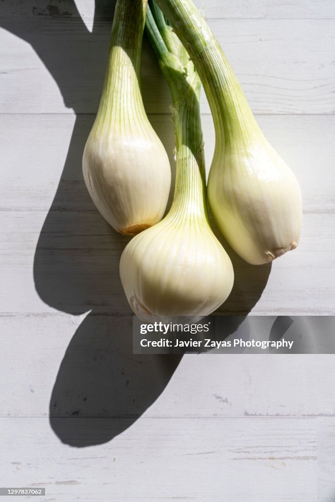Sweet Onions On Wooden Background