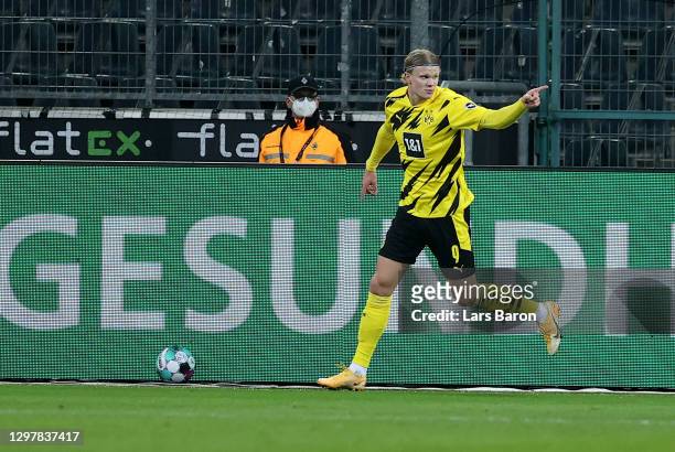 Erling Håland of Dortmund celebrates after he scores the equalizing goal during the Bundesliga match between Borussia Moenchengladbach and Borussia...